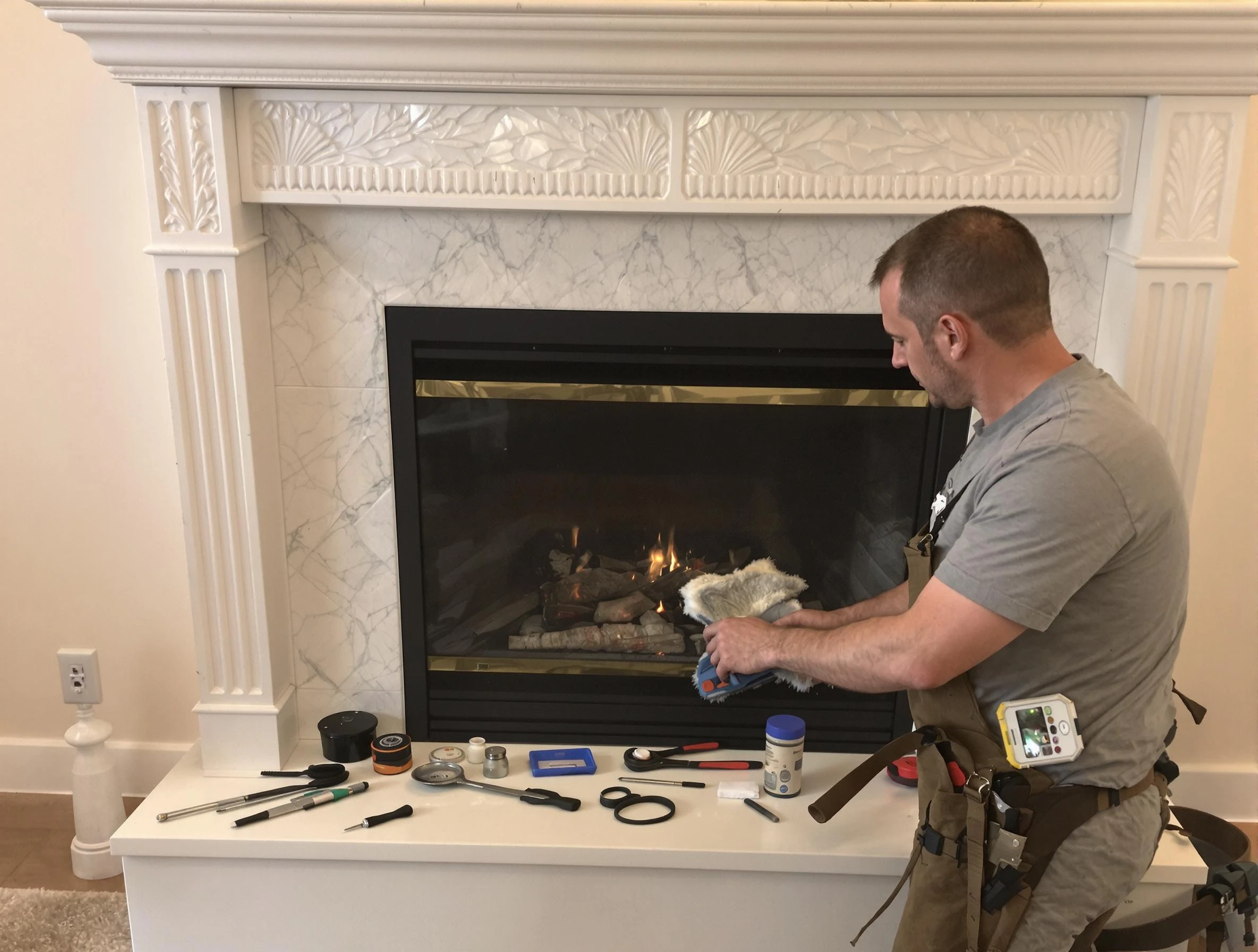 Birmingham Chimney Sweep performing fireplace maintenance in Birmingham, AL